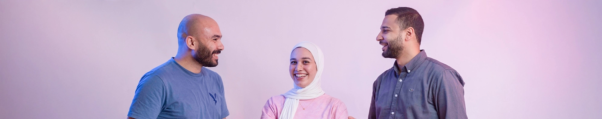 Three teammates standing together